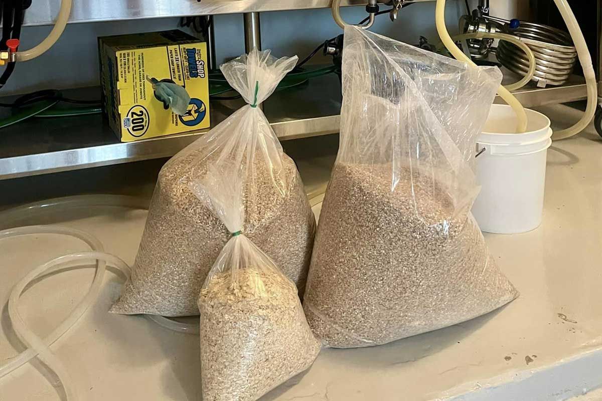 Bags of barley, wheat, and oats